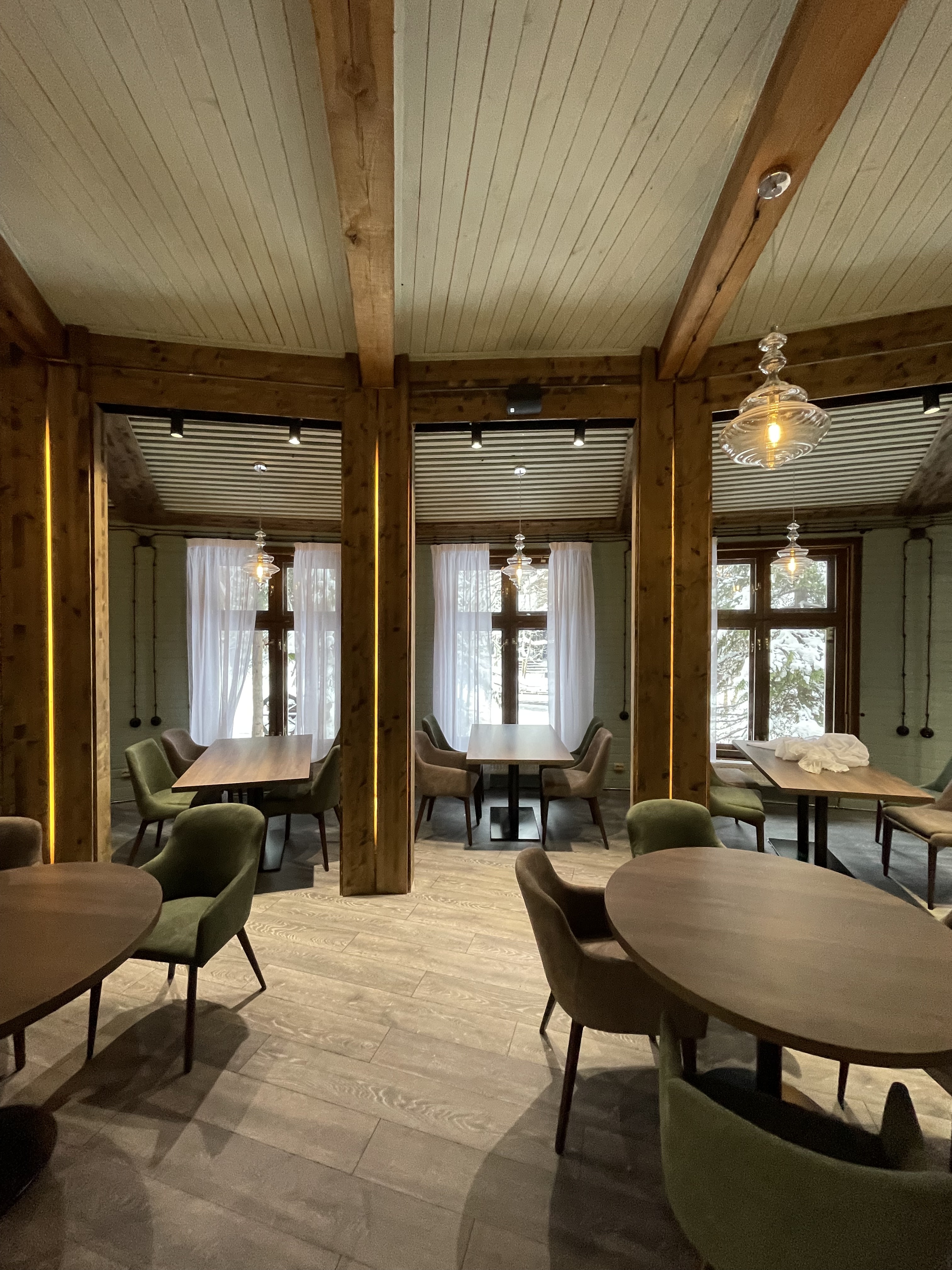 Restaurant dining area detail with layered textiles